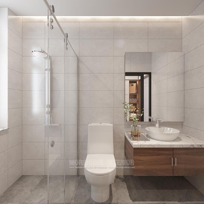Bạn đang muốn sở hữu mẫu thiết kế phòng tắm đơn giản đẹp, ý tưởng sử dụng vách tắm kính cửa trượt giúp không gian trở nên thông thoáng, tiện ích, gương ốp tường không bo viền, tường đơn sắc nhưng tổng hòa lại tạo nên bức tranh sang trọng ấn tượng. Thiết kế nội thất